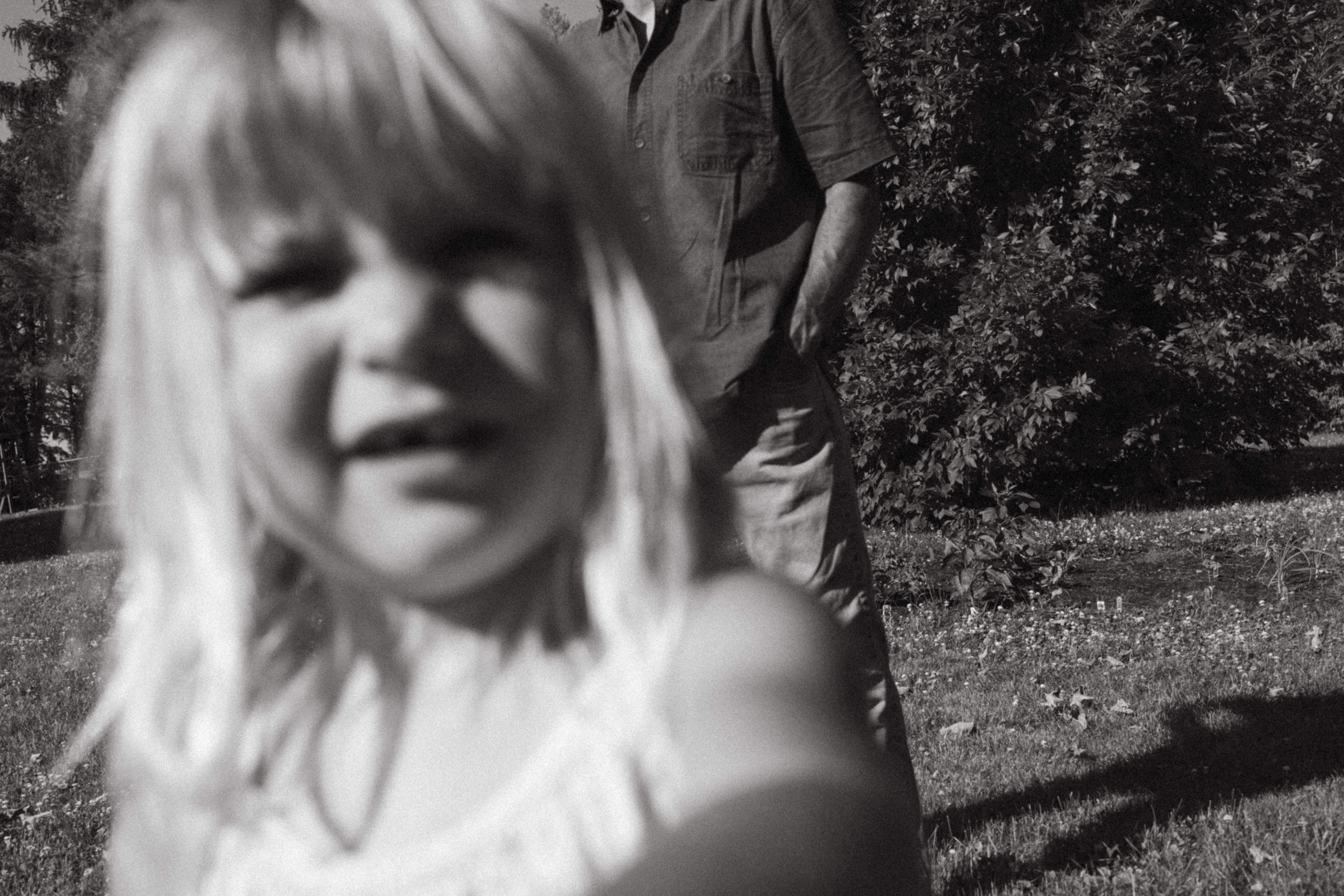 candid moment during backyard family session documentary style with an editorial result