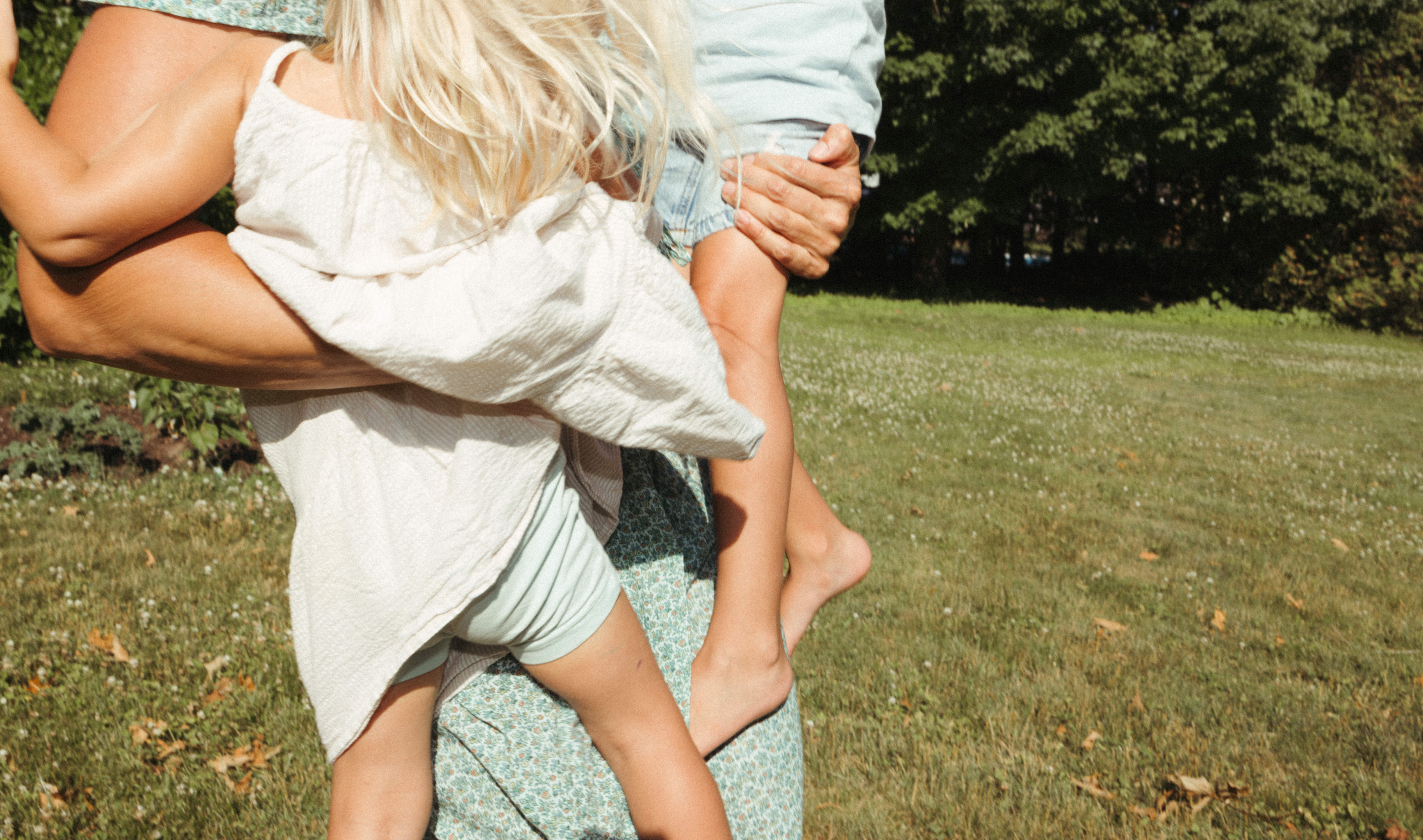beautiful candid documentary moment with mother and children shot by top family ottawa photographer