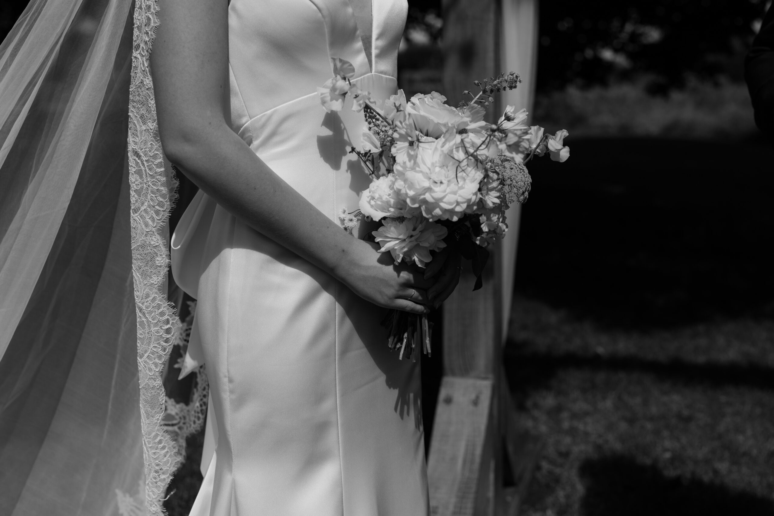 bridal portrait with florals during ceremony