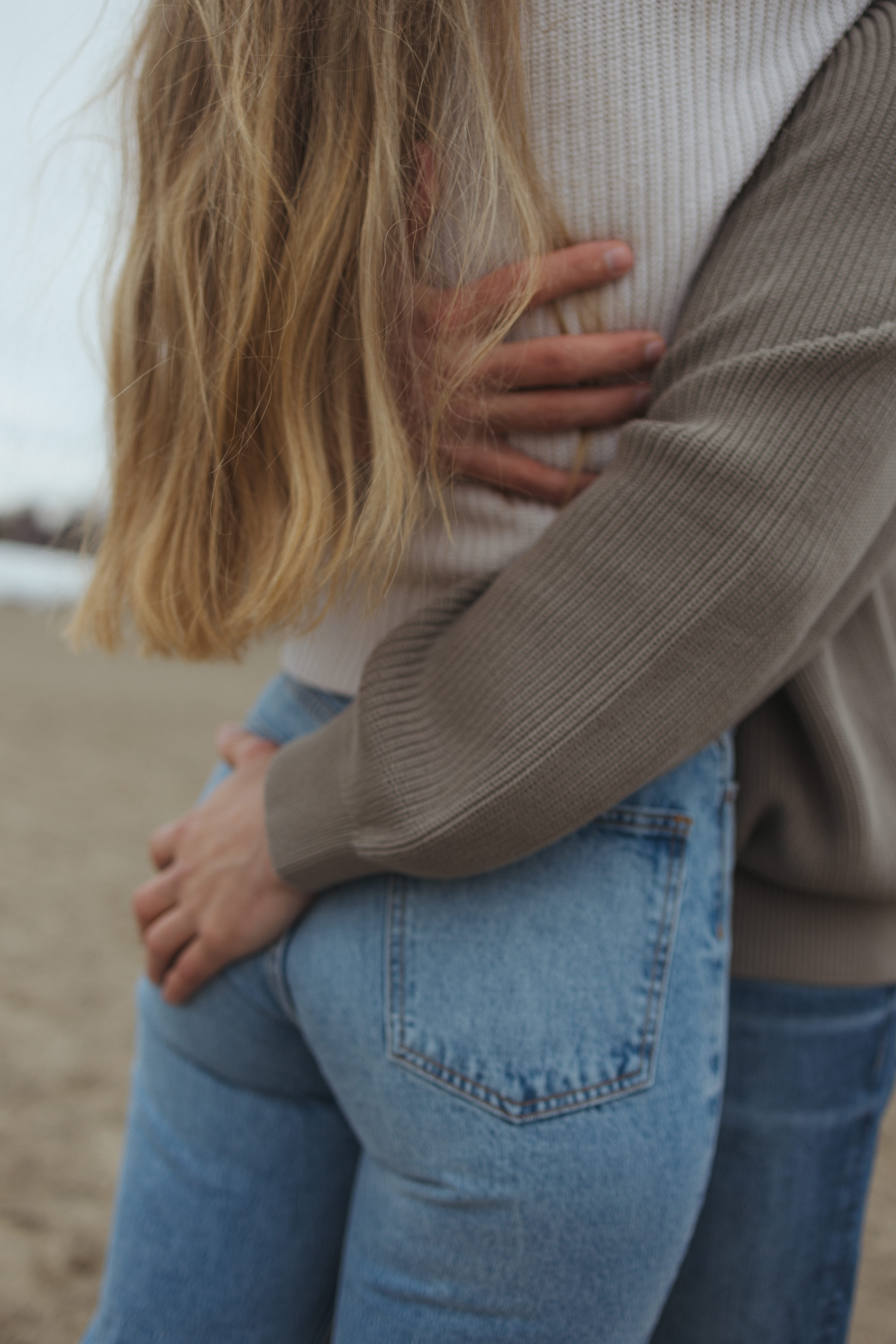 hugging during their engagement session