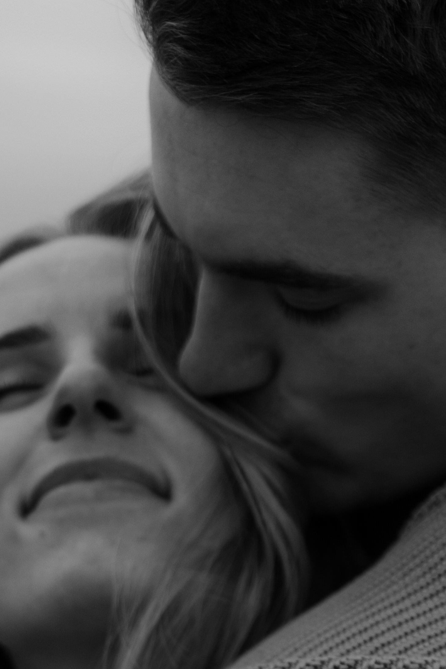 intimate moment between couple during spring beach session
