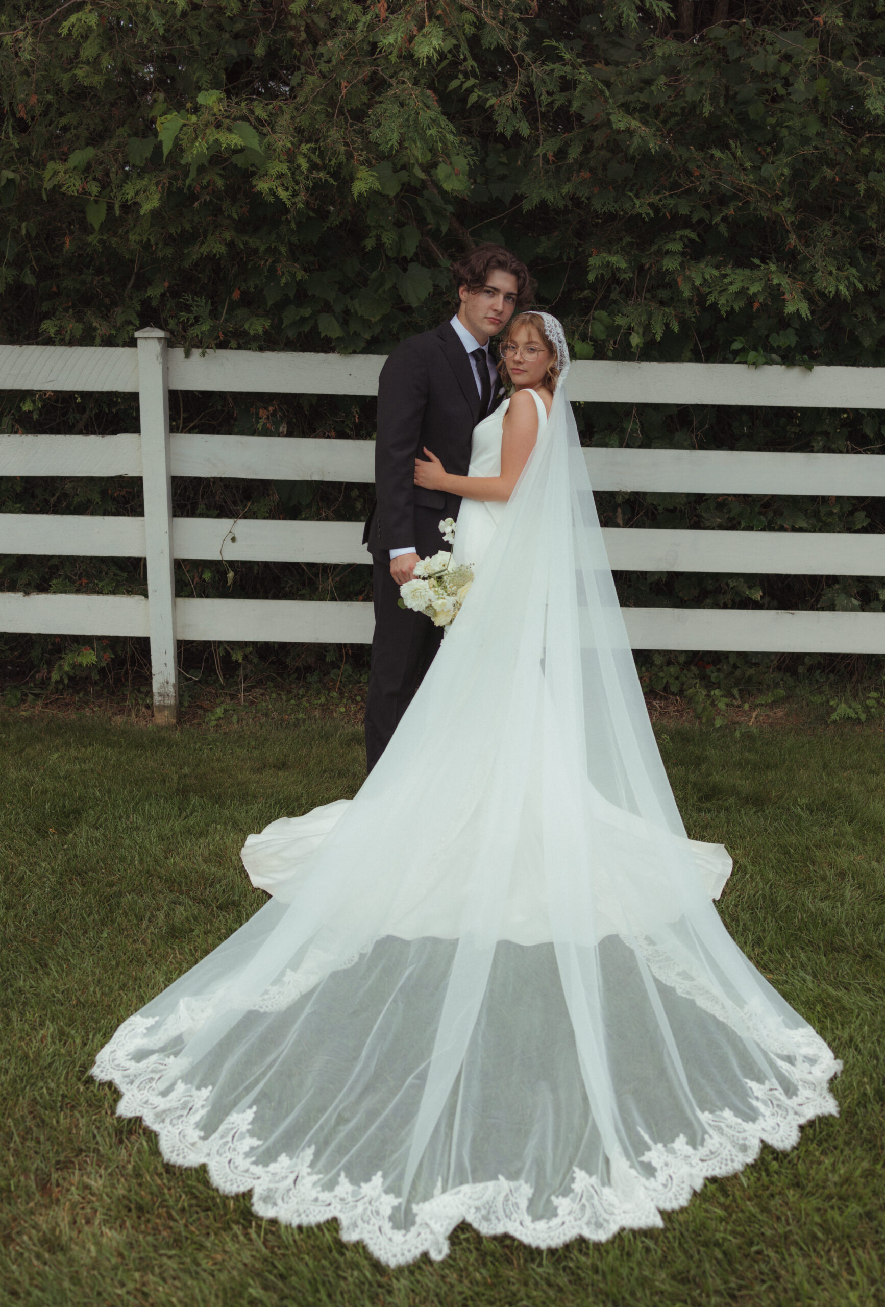Couple after ceremony with editorial-style pose