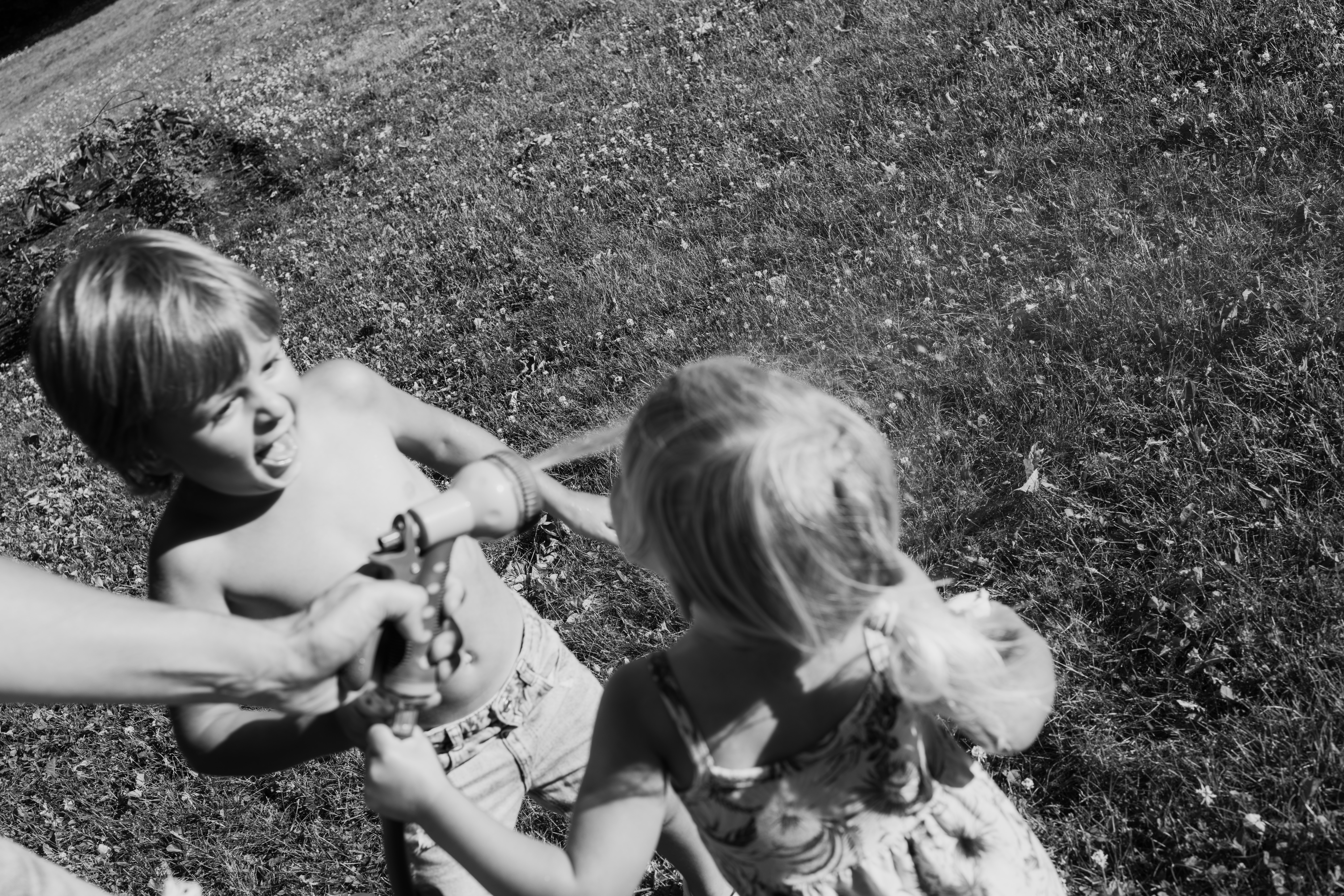 candid moment between siblings shared outside 